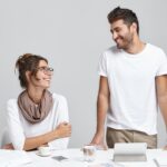 people-business-teamwork-and-cooperation-concept-creative-happy-young-woman-and-bearded-man-desig.jpg